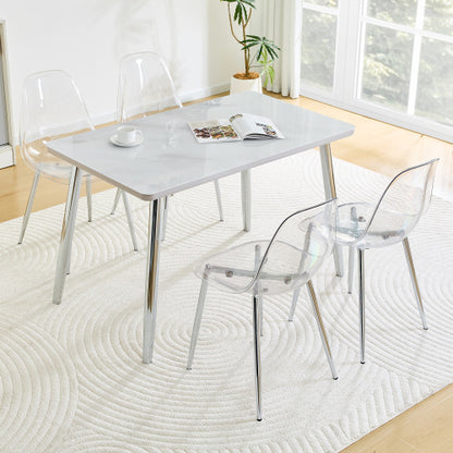 COMEDOR #7-Table and 4 chair set.White imitation marble texture glass countertop + lower MDF board, silver metal tapered legs.Paired with 4 Transparent Plastic Chairs with Silver Metal Legs.