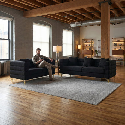 SALA NEGRAS #1 A Black modern-design plush cloud-shaped sofa set featuring luxurious metal legs and coordinating throw pillows, with a wavy, cloud-shaped backrest design