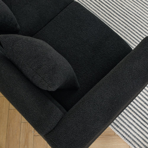 SALA NEGRAS #1 A Black modern-design plush cloud-shaped sofa set featuring luxurious metal legs and coordinating throw pillows, with a wavy, cloud-shaped backrest design