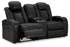 Caveman Den - Power Reclining Loveseat with Console/ Adj Hdrst - Midnight
